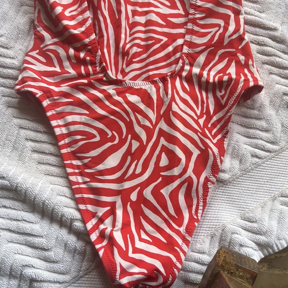 NWT FP x ITS NOW COOL the showtime one piece in fuego Zebra red white size small